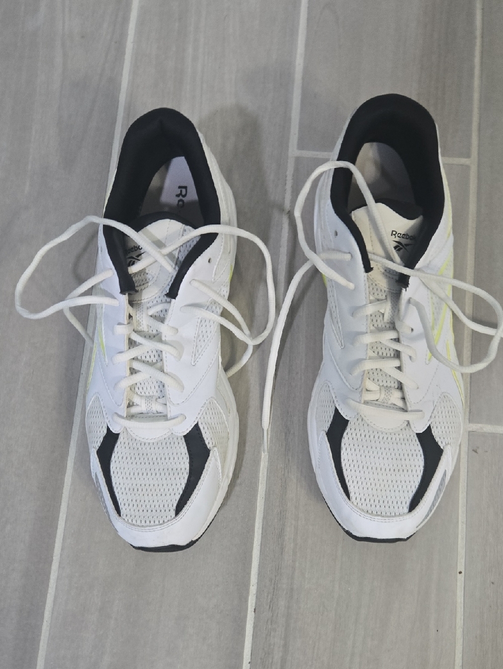 Reebok Men's White Athletic Sneakers with Black and Yellow Accents